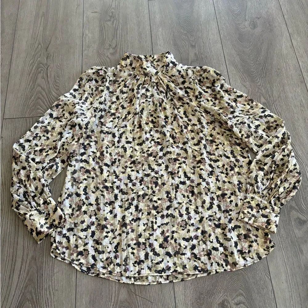H&M woman’s used top with floral design